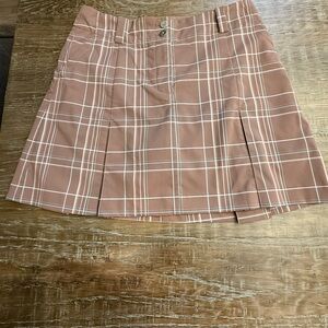 Nike Golf 
Nike Fit Dry gold skirt size 6
